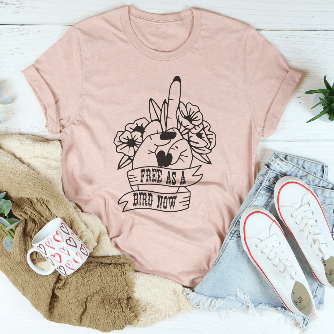 Peach crew-neck T-shirt with bird-and-cat floral graphic