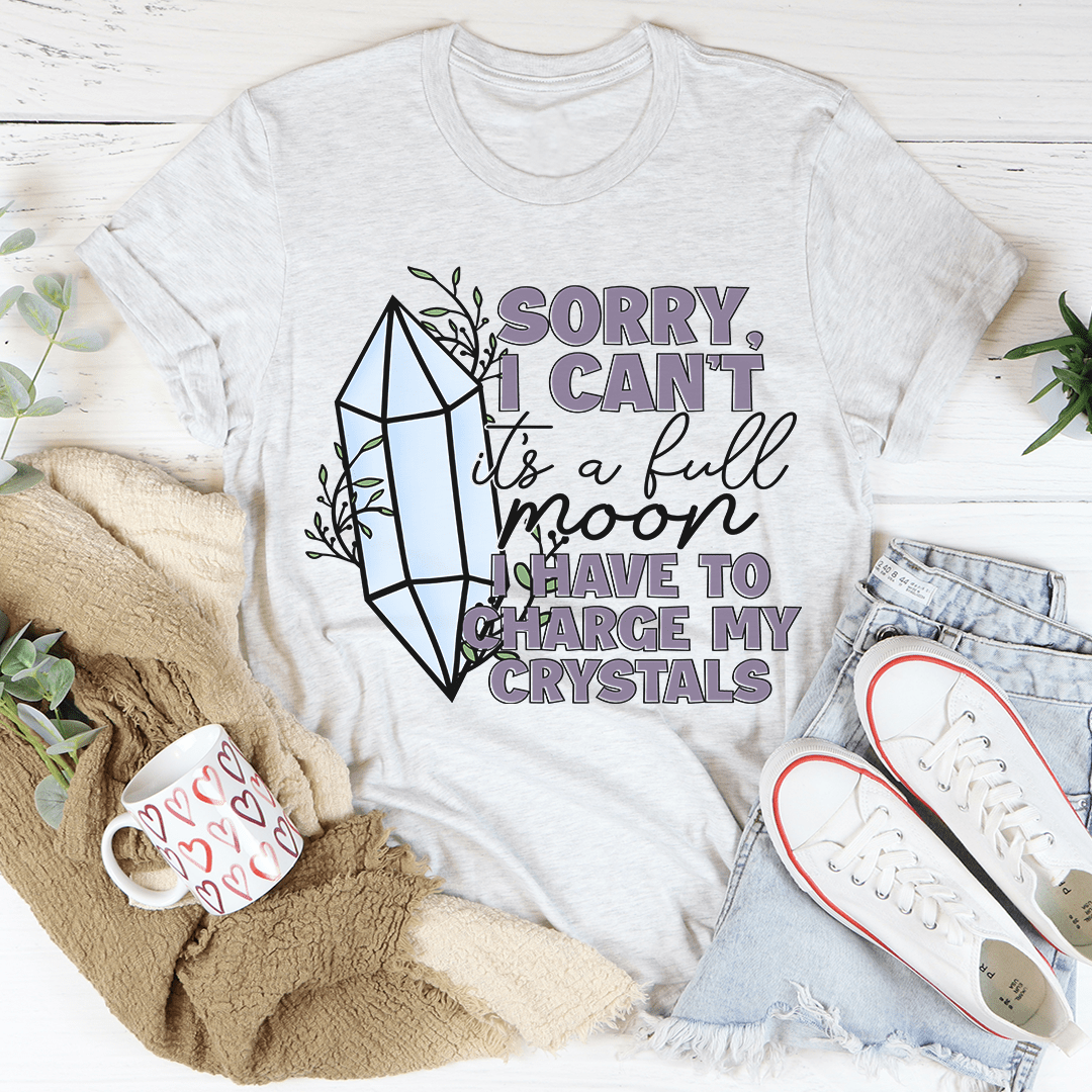 Light gray T-shirt with front crystal lantern graphic and "SORRY, I CAN'T" text