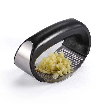 Stainless steel garlic press with black handle and perforated crushing plate