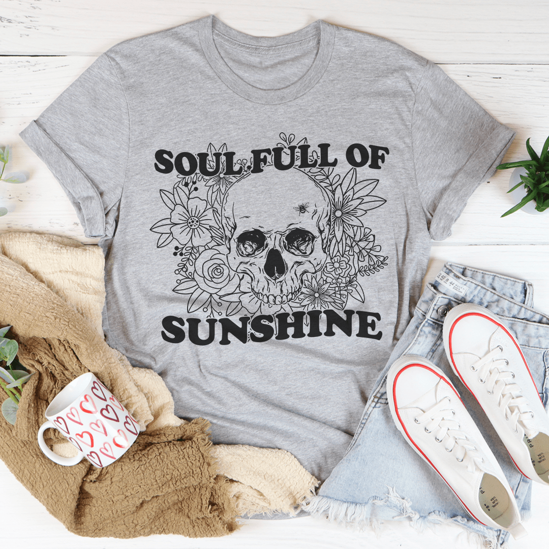 Heather gray crew-neck T-shirt showing large skull-and-flowers front graphic.