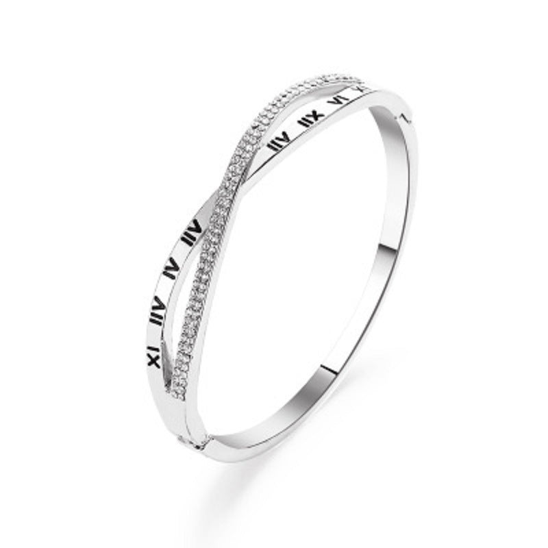 Silver-tone roman numeral bracelet bangle with rhinestone pave strip and engraved numbers