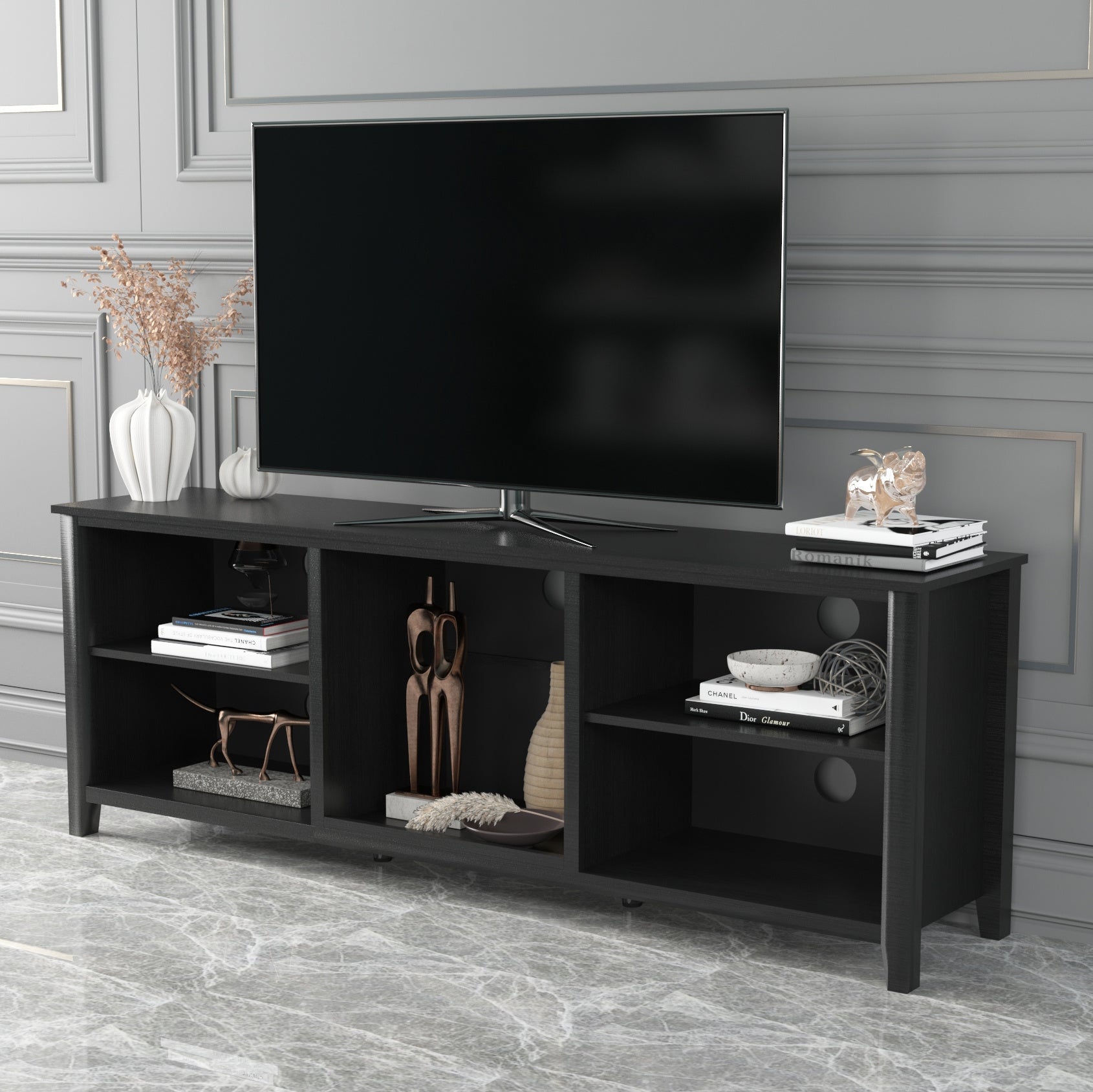 Black TV stand storage console with open shelves and center media cubby for devices.