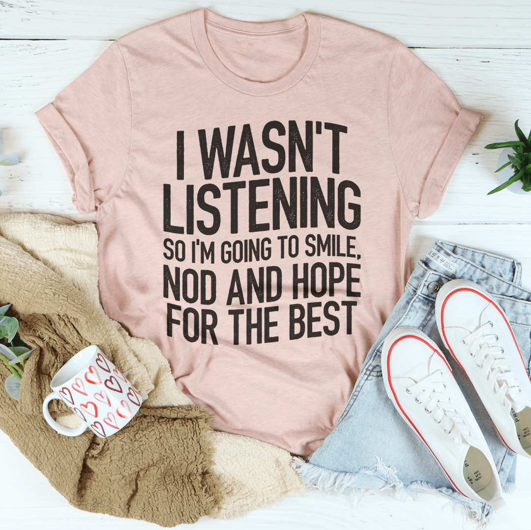 Mauve graphic slogan T-shirt with bold "I WASN'T LISTENING" text