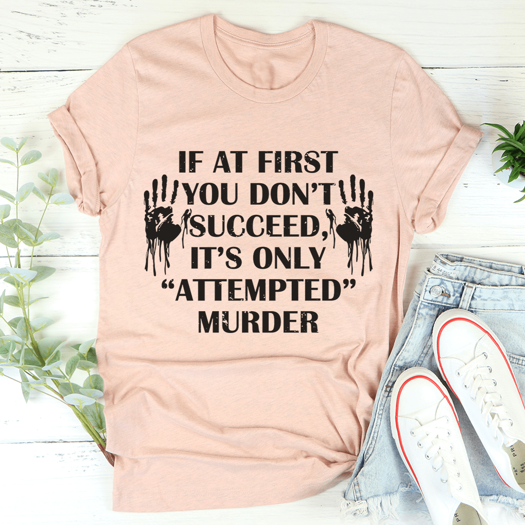 Peach crewneck T-shirt with black motivational quote graphic