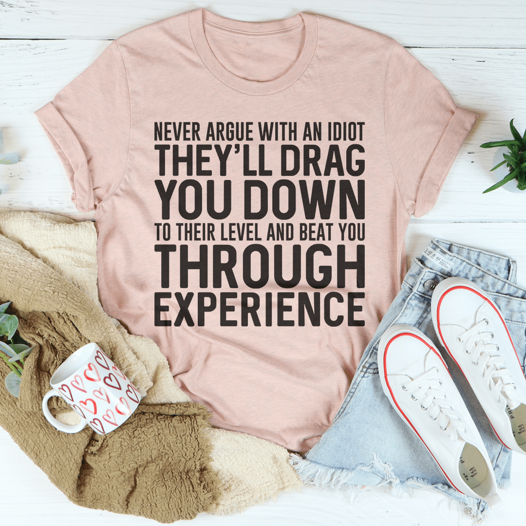 Mauve crew-neck T-shirt with large black quote graphic on front