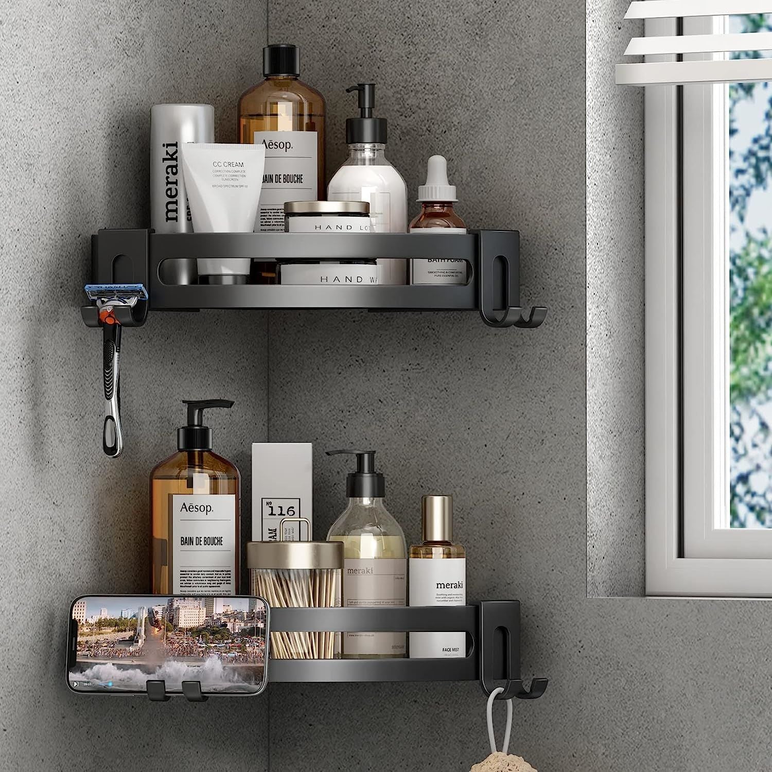 Black corner shower shelf caddy with two-tier storage and side hooks for toiletries
