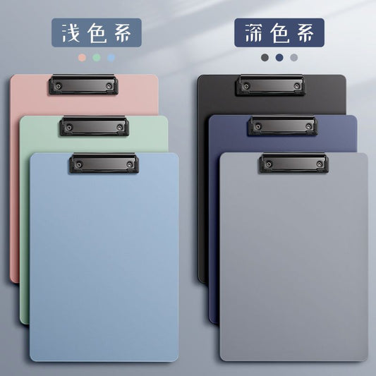 Plastic A4 clipboards set in pastel and dark colors with metal clip, stacked