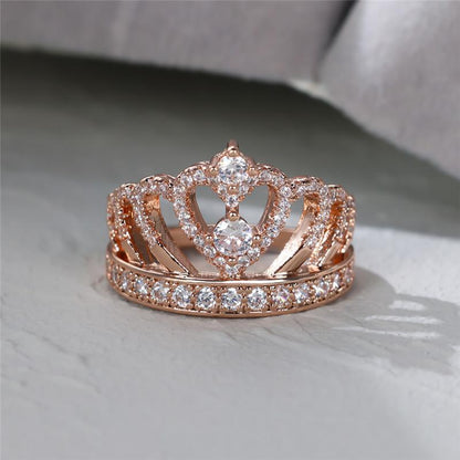 Rose-gold tone heart crown promise ring with clear stones, flat top