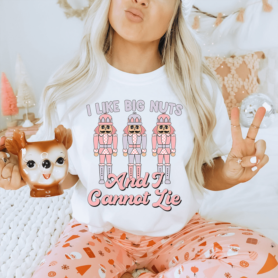 White T-shirt featuring 'I Like Big Nuts And I Cannot Lie' with three cartoon nut characters