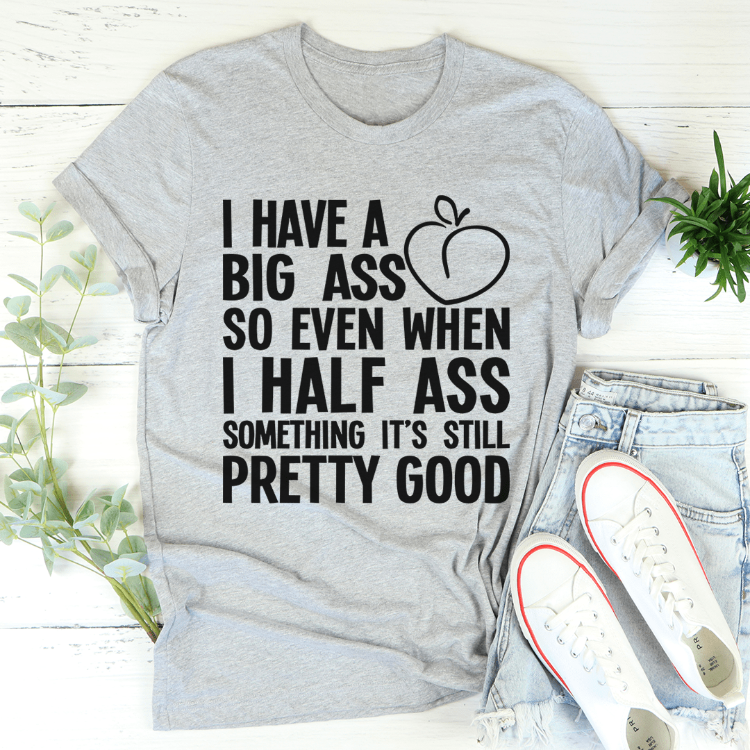 Heather gray crew-neck T-shirt with black quote text and heart graphic on front