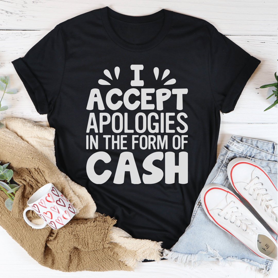 Black graphic t-shirt with 'I ACCEPT APOLOGIES IN THE FORM OF CASH' text