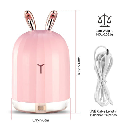 Pink cool mist humidifier with rose-gold antler top and silver base ring