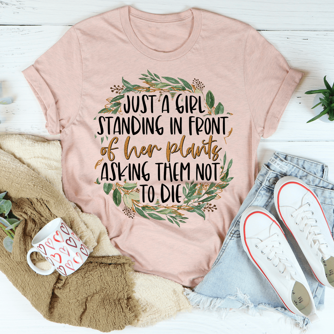 Peach T-shirt with green leaf wreath quote graphic on the front