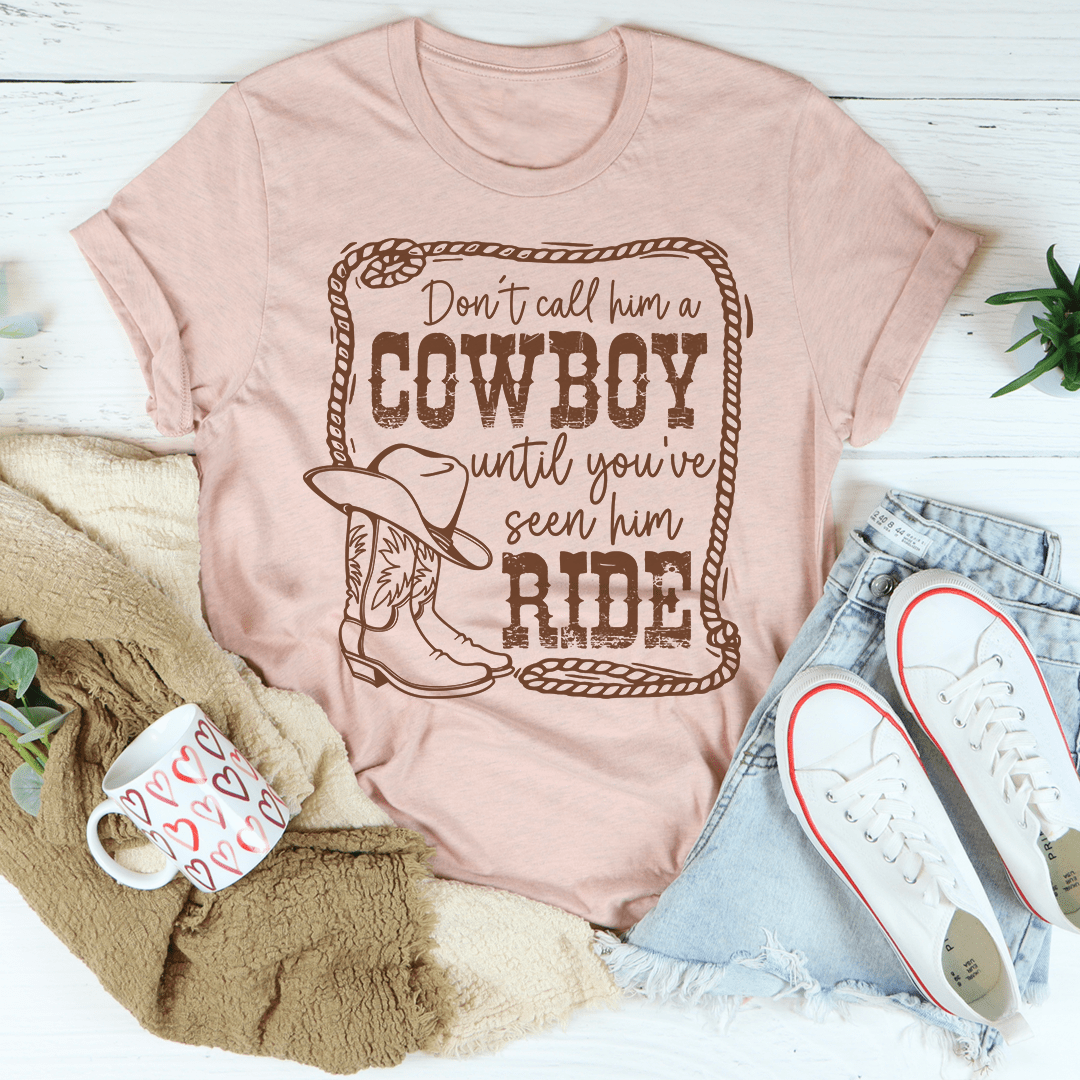 Heather peach T-shirt with cowboy graphic on the front