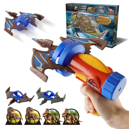 Rocket launcher airplane toy with foam dinosaur pterosaur targets, orange and blue body.
