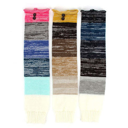3 pairs of multi-color winter socks with pink, tan, and dark blue top sections.