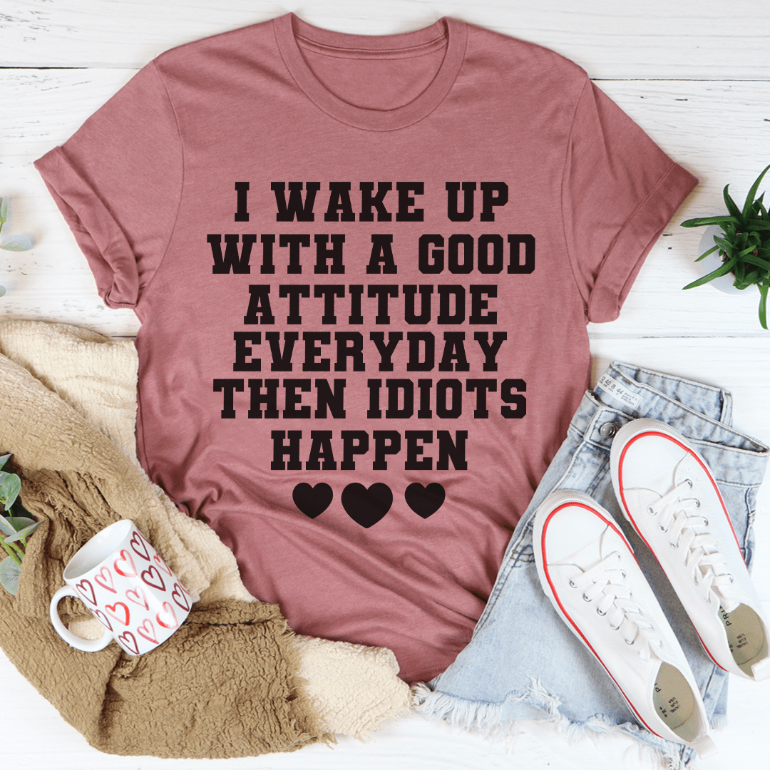 Mauve T-shirt with large black attitude slogan and heart icons.
