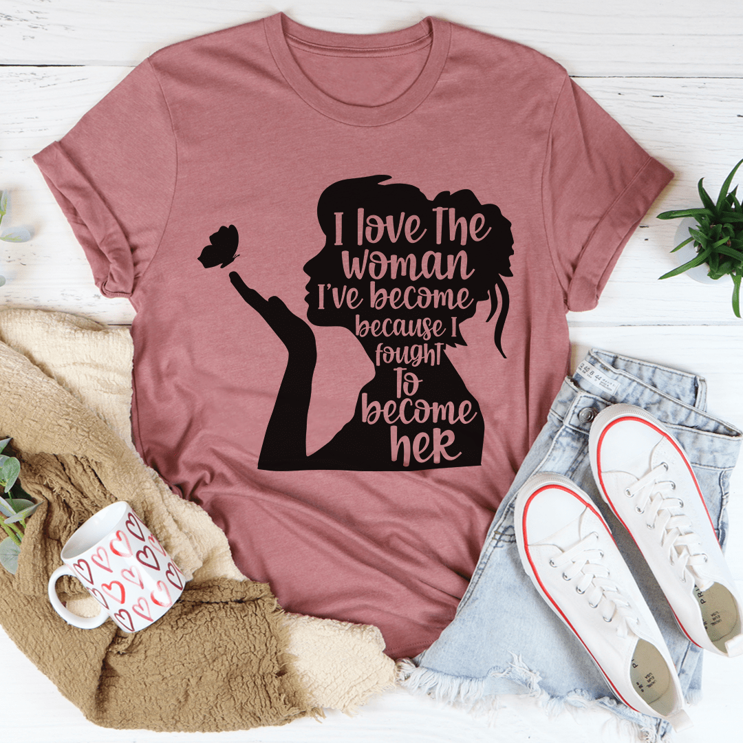 Mauve women's graphic T-shirt with raised fist silhouette and slogan print