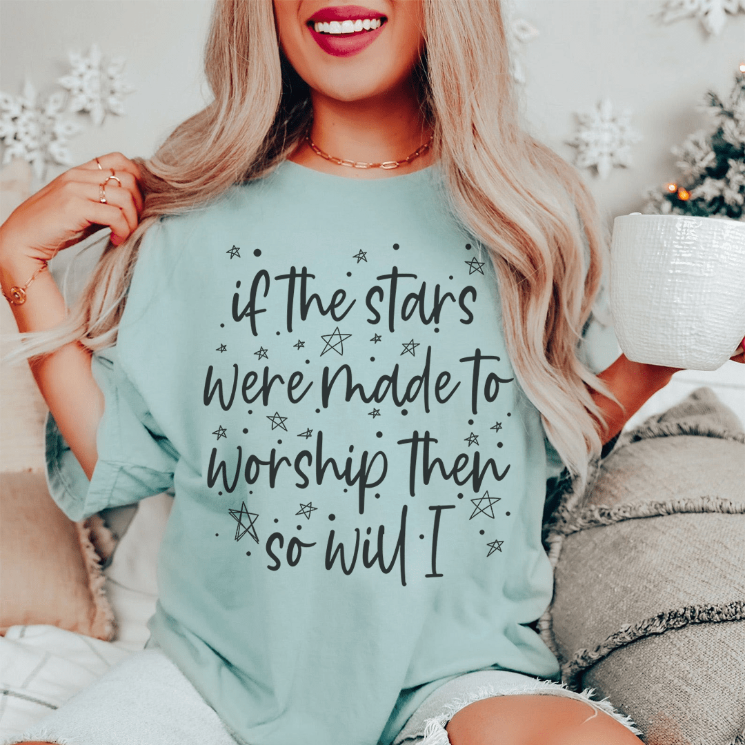 Light blue t-shirt with white and black starry slogan graphic on front