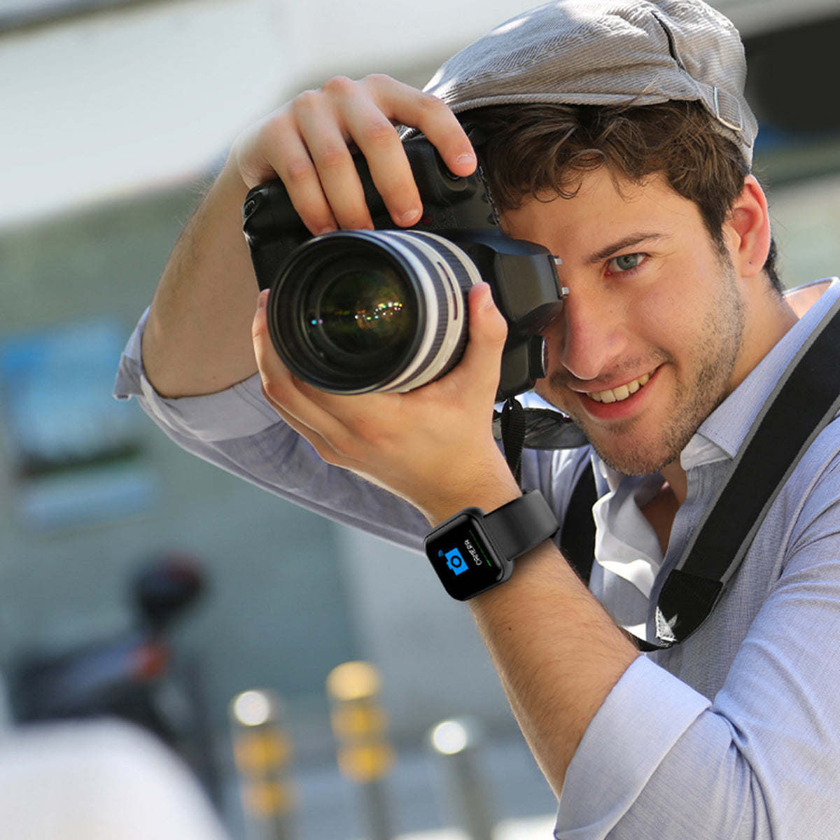 Black smartwatch with a rectangular screen worn on a man’s wrist