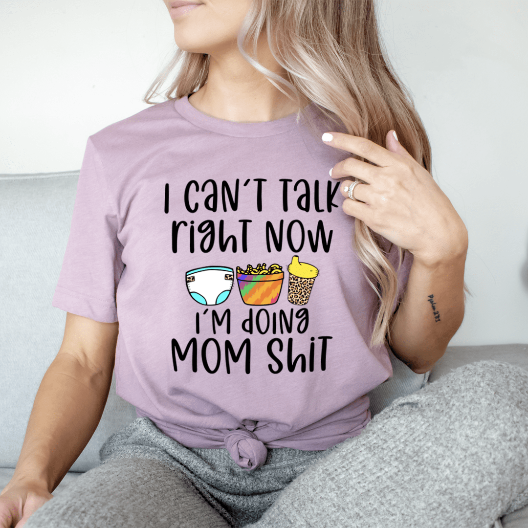Heather orchid T-shirt with 'I can't talk right now' and 'Mom shit' front graphic