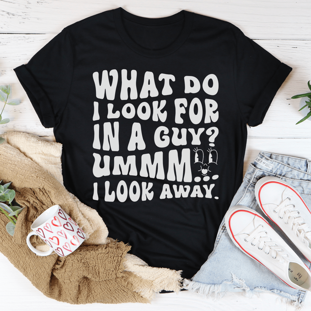 Black T-shirt with bold white 'What do I look for in a guy?' text graphic