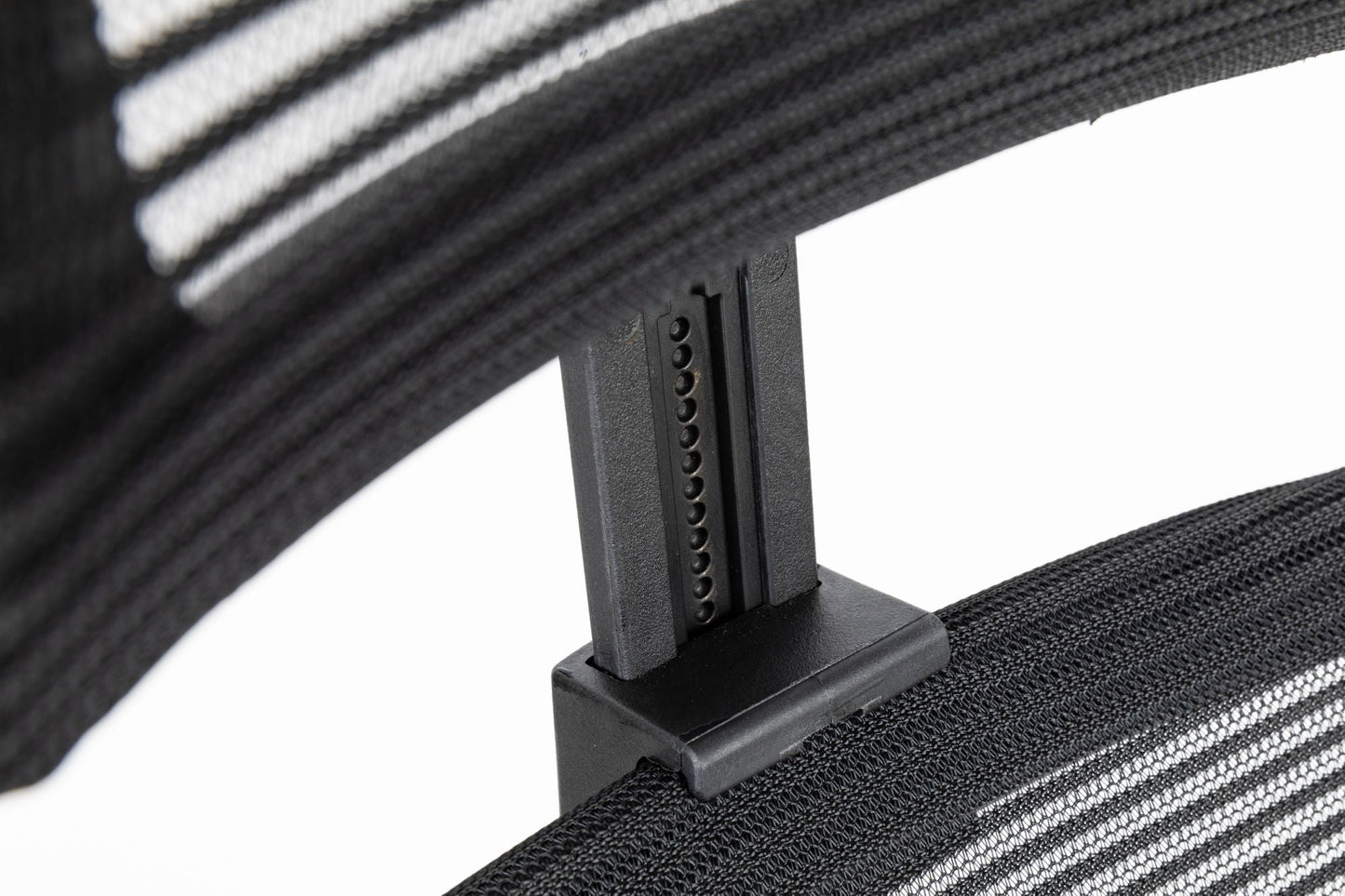 Black office chair close-up of armrest support over mesh back panel