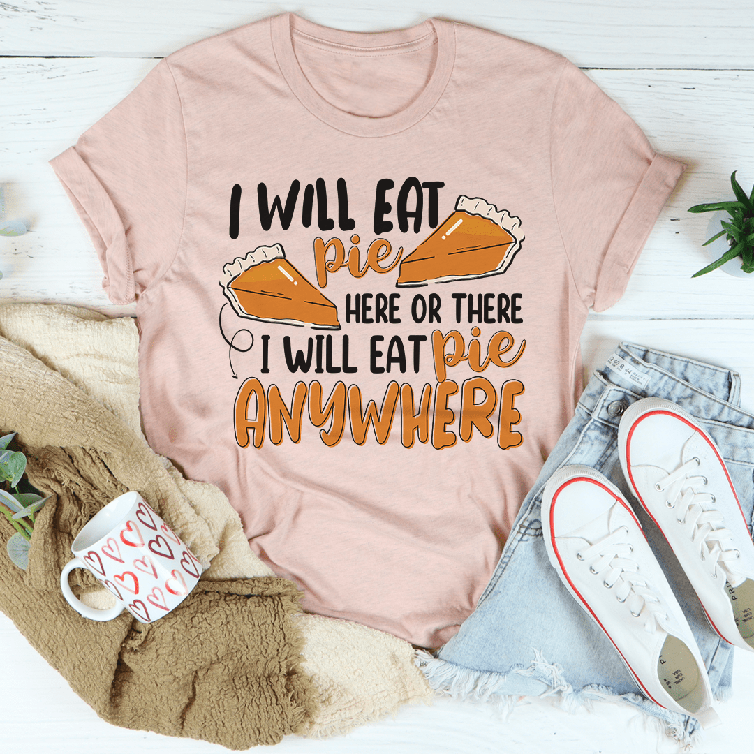 Blush pink crew-neck T-shirt with pie slogan graphic and “anywhere” text