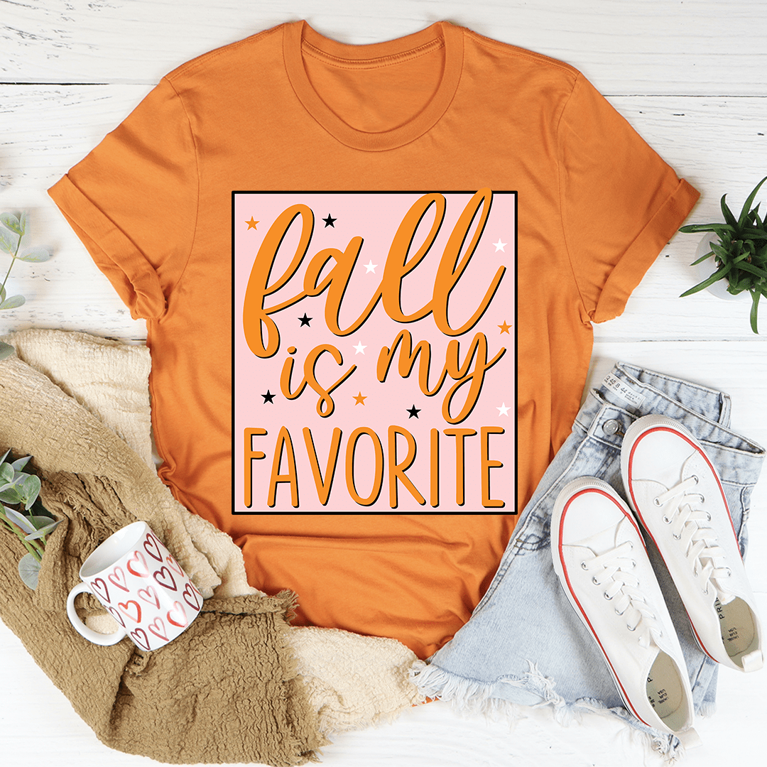 Warm orange crewneck short-sleeve T-shirt with centered square 'Fall is my favorite' graphic