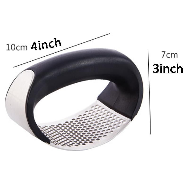 Compact arc-shaped garlic press with black handle and stainless perforated base