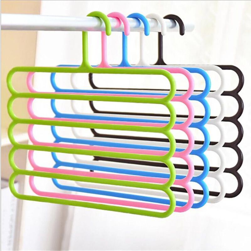 Stacked 5-layer plastic hangers with colorful bars for organizing scarves