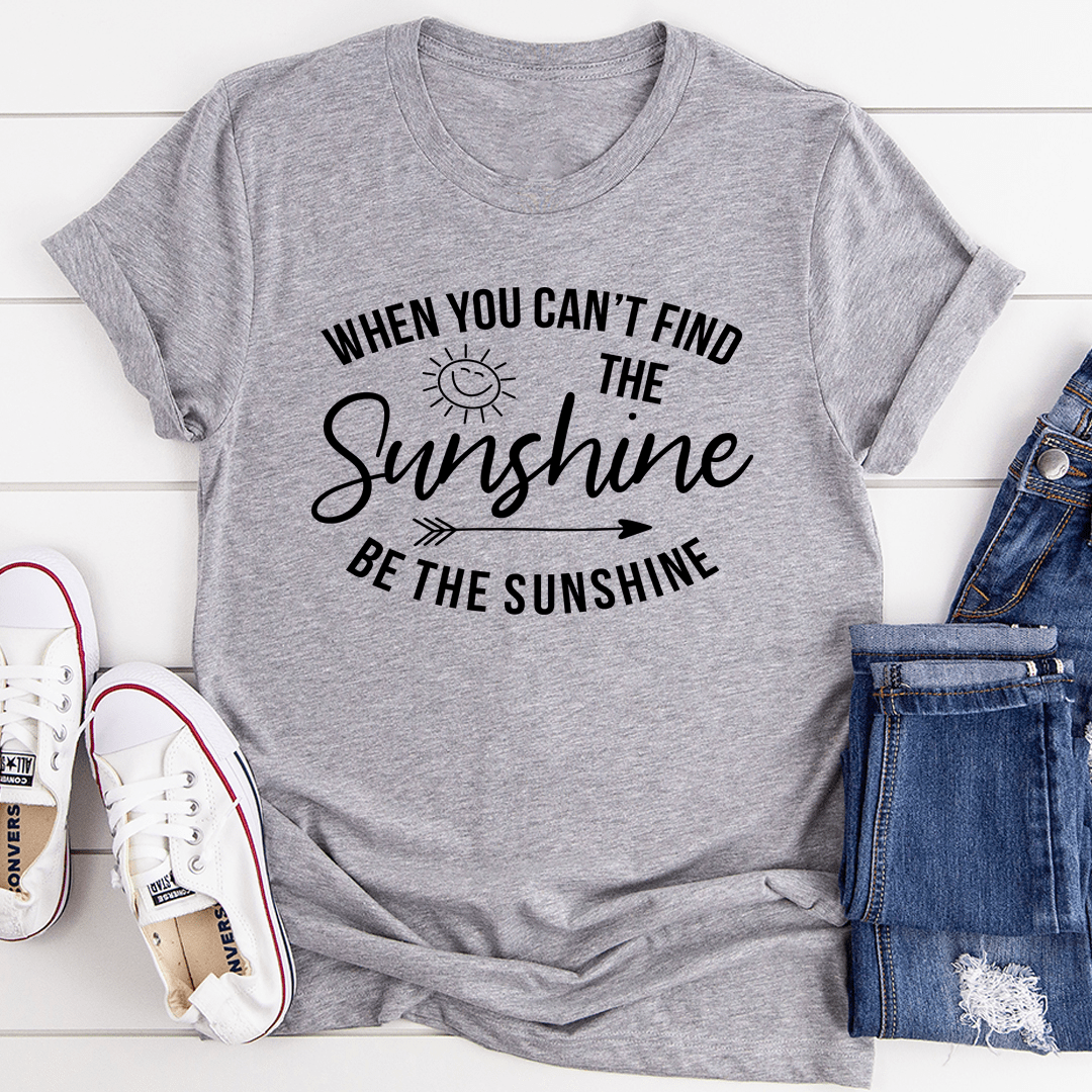 Heather grey crew-neck T-shirt with 'Sunshine' print and 'Be the Sunshine' slogan.