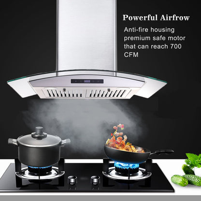 30-inch wall mounted range hood with stainless steel chimney and clear glass visor above stove