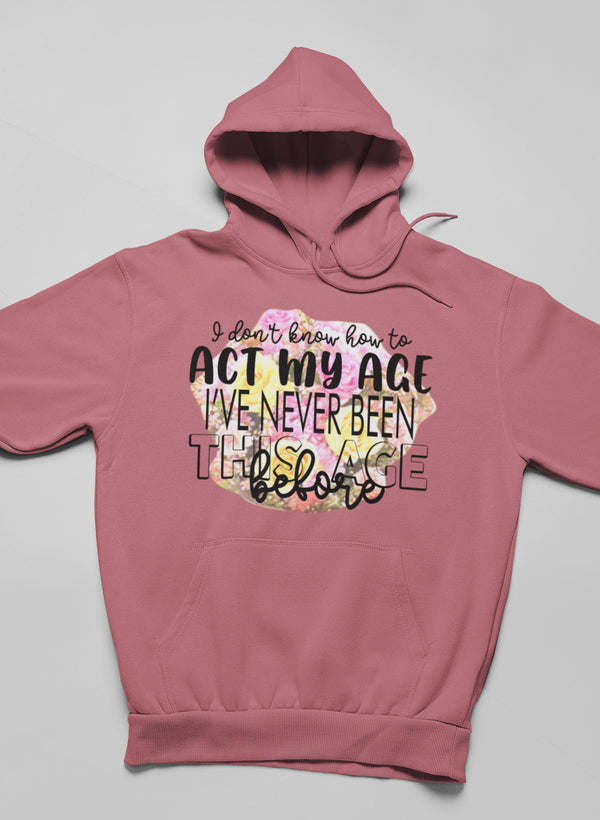 Dusty rose pullover hoodie with front graphic text, hood and kangaroo pocket