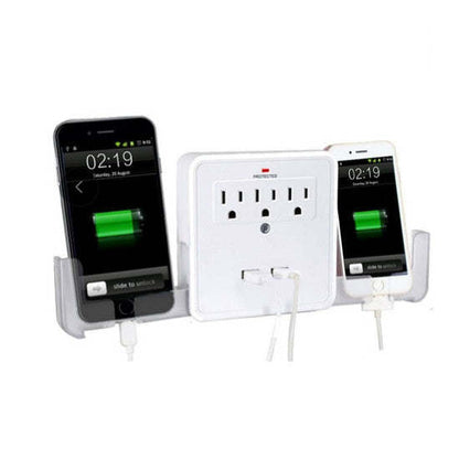 White wall power adapter with three AC outlets and dual USB ports beside two phones