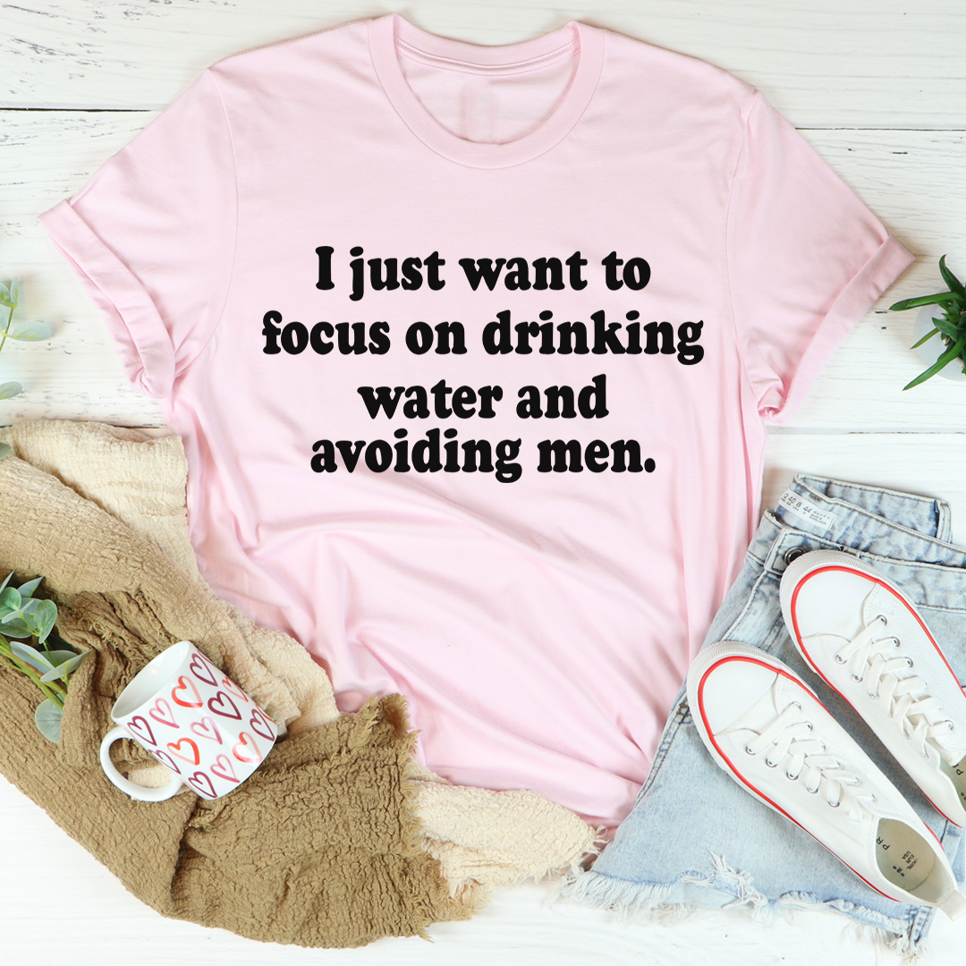 Light pink crewneck T-shirt with slogan about drinking water and avoiding men