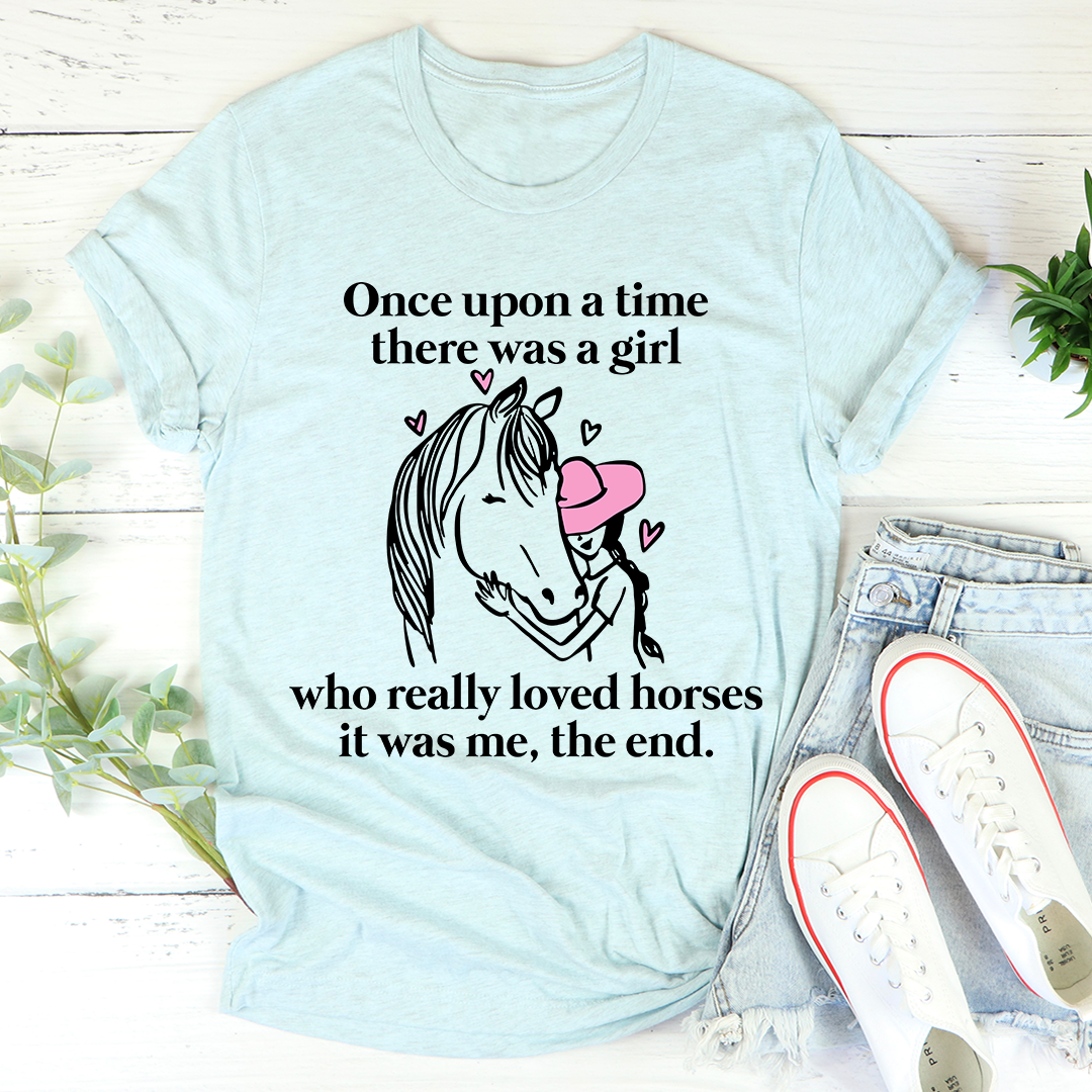 Light blue graphic t-shirt with horse-and-girl quote and pink heart accents