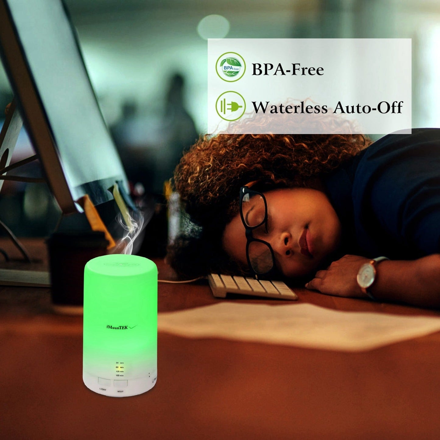 White mini aroma diffuser with glowing green LED light