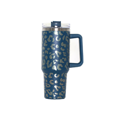 Blue leopard vacuum tumbler with handle, clear lid, and drinking straw