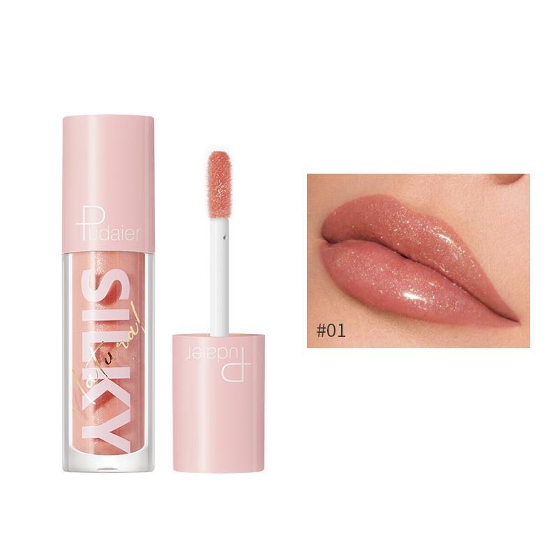 Lip luminizer gloss in clear pink tube with doe-foot applicator, swatched #01