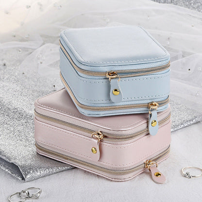 Small PU jewelry case with double zippers, light blue and pink stack, built-in mirror