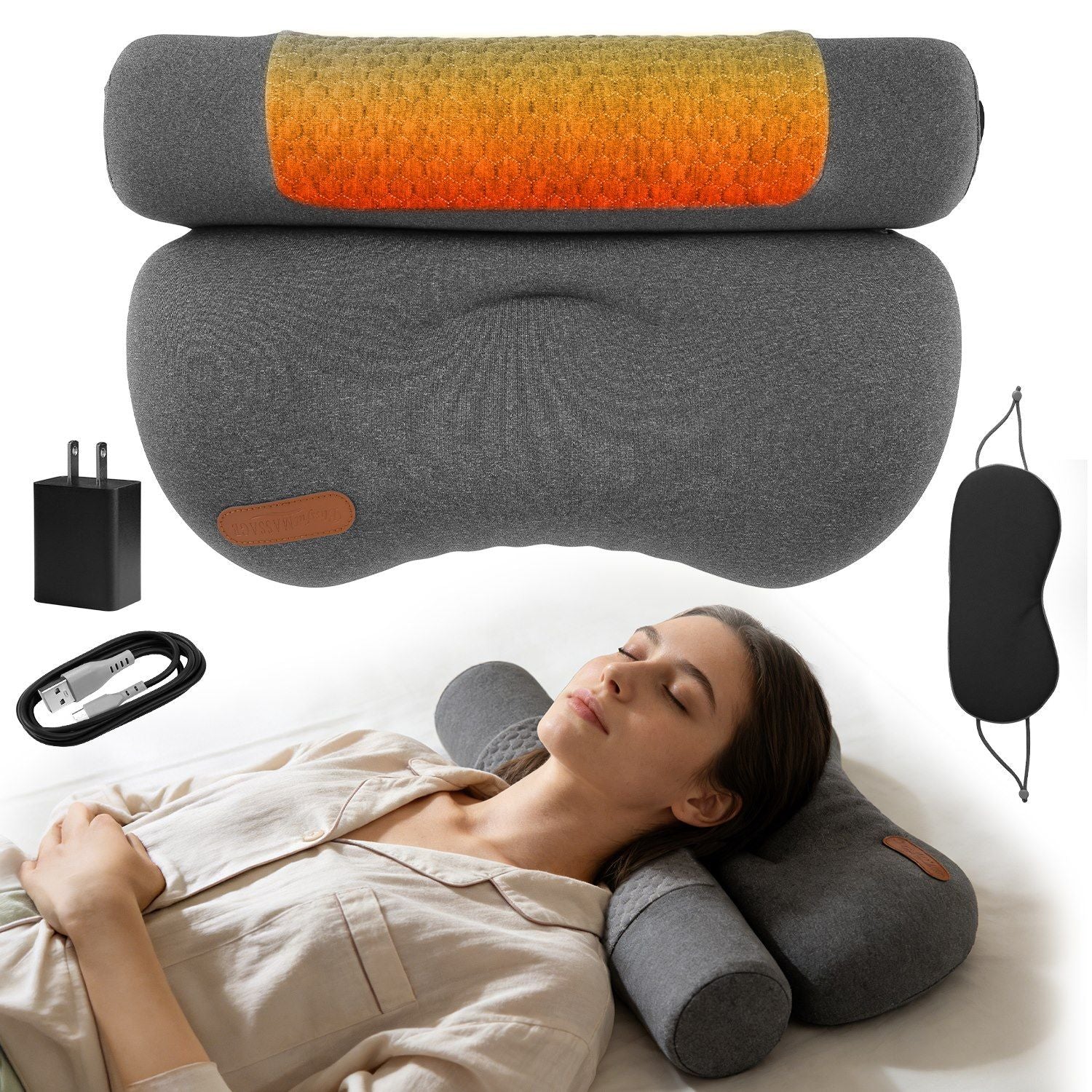Dark grey heated neck pillow with visible orange warming panel and power cord