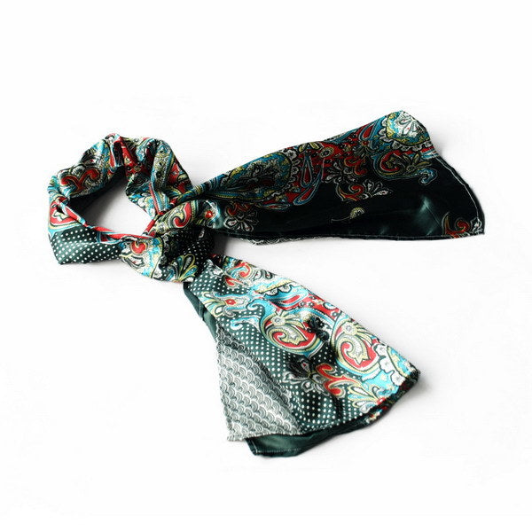 Green satin scarf with paisley and polka-dot patterns, tied bow at ends