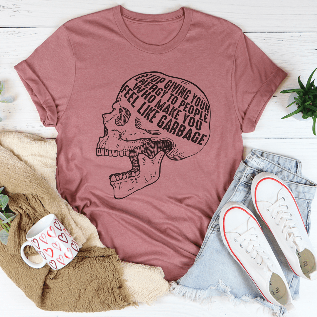 Mauve T-shirt with distressed skull and quote graphic on the front