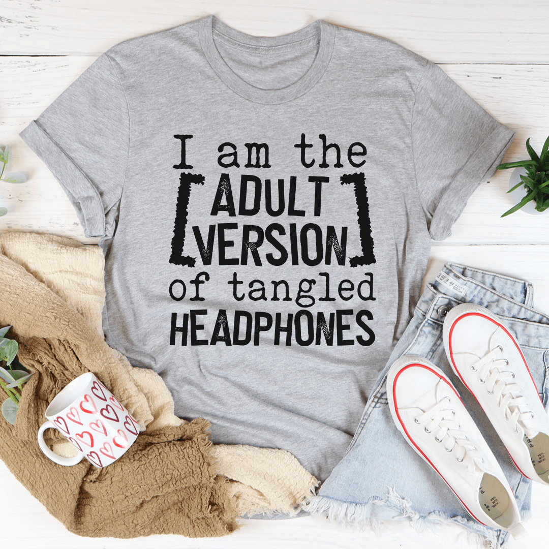 Light gray crewneck T-shirt with black typography: ADULT VERSION of tangled HEADPHONES