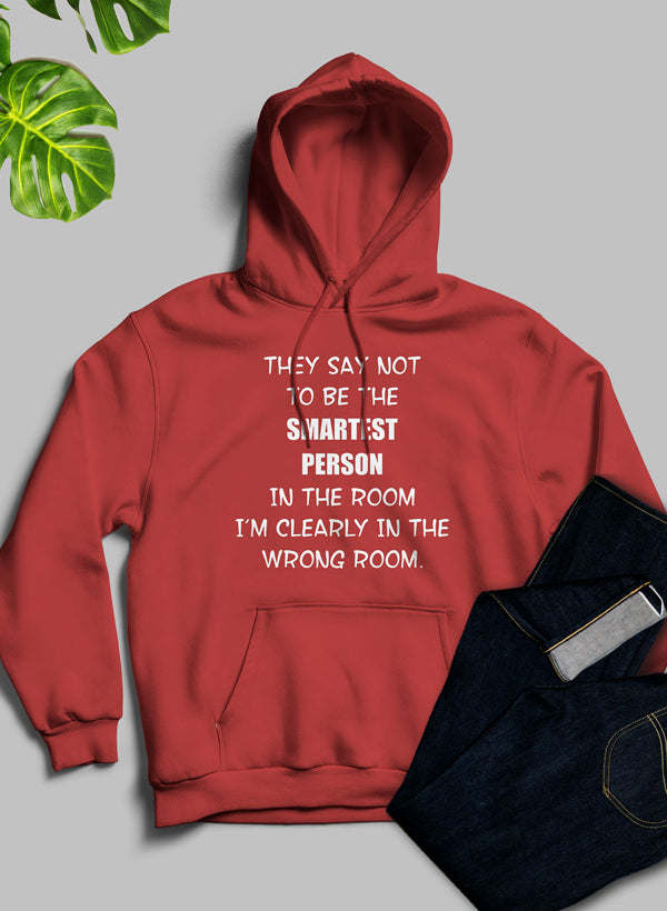 Red pullover hoodie with front pocket and bold chest slogan graphic