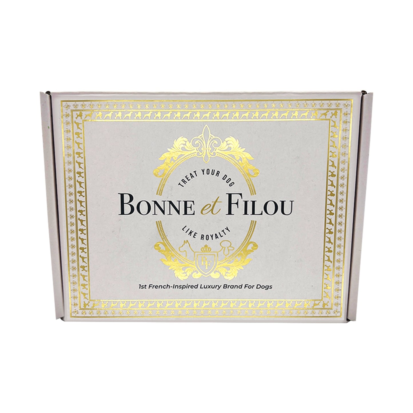 Bonne et Filou dog treats gift box with gold crest logo on gray.