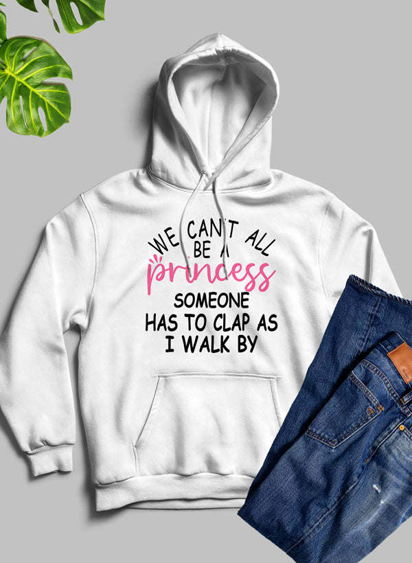 White pullover hoodie with hood and kangaroo pocket, princess-themed quote graphic.