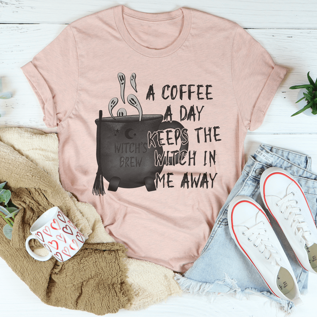 Blush pink crewneck t-shirt with coffee pot and witch-themed front graphic
