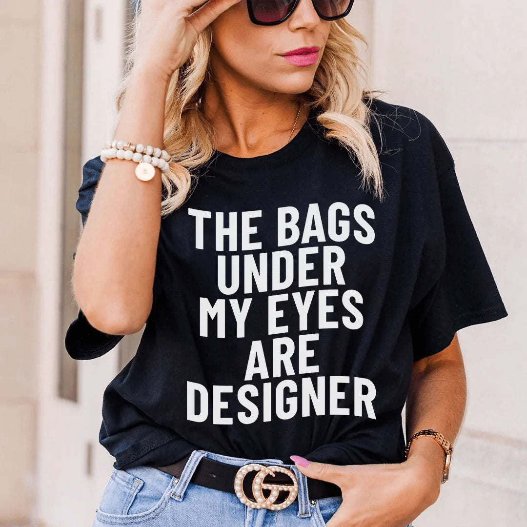 Black heather T-shirt with white slogan graphic across the chest, crew neck